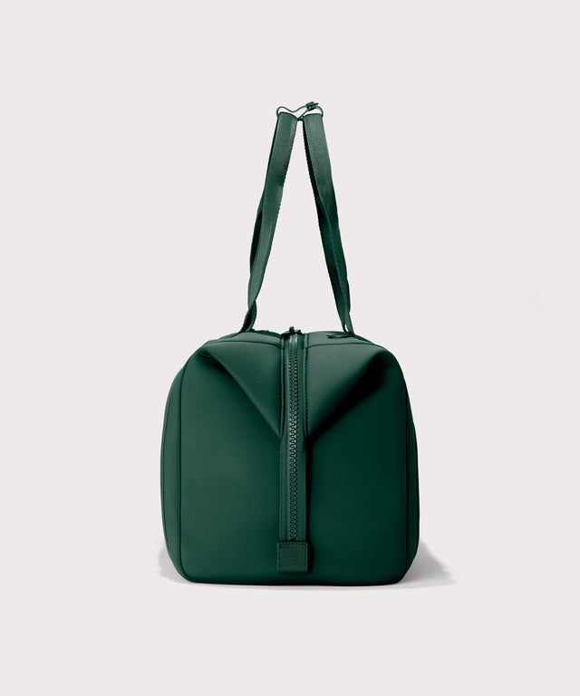 Large Landon Carryall in a saturated, jewel-toned deep green with bold blue undertones., side view
