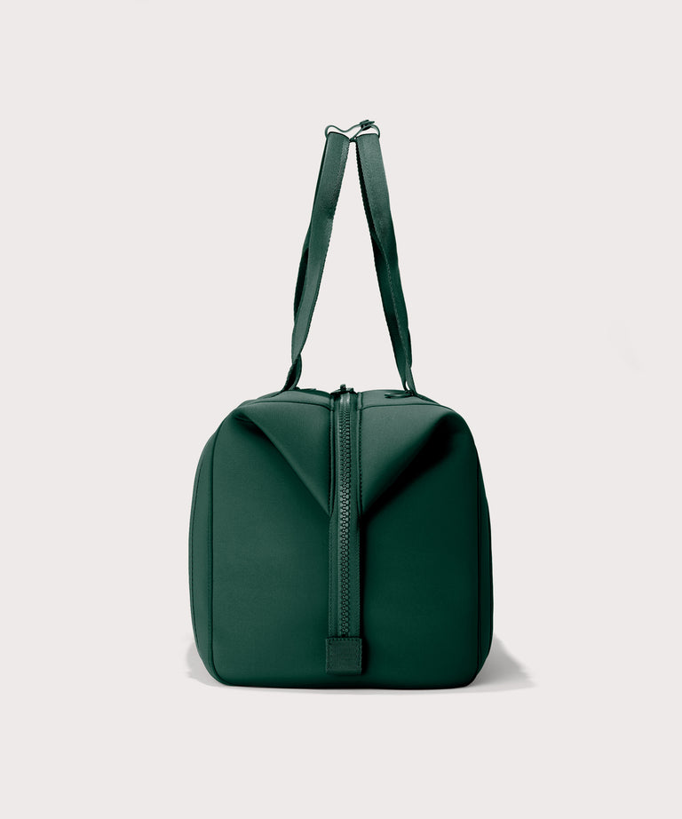 Large Landon Carryall in a saturated, jewel-toned deep green with bold blue undertones., side view
