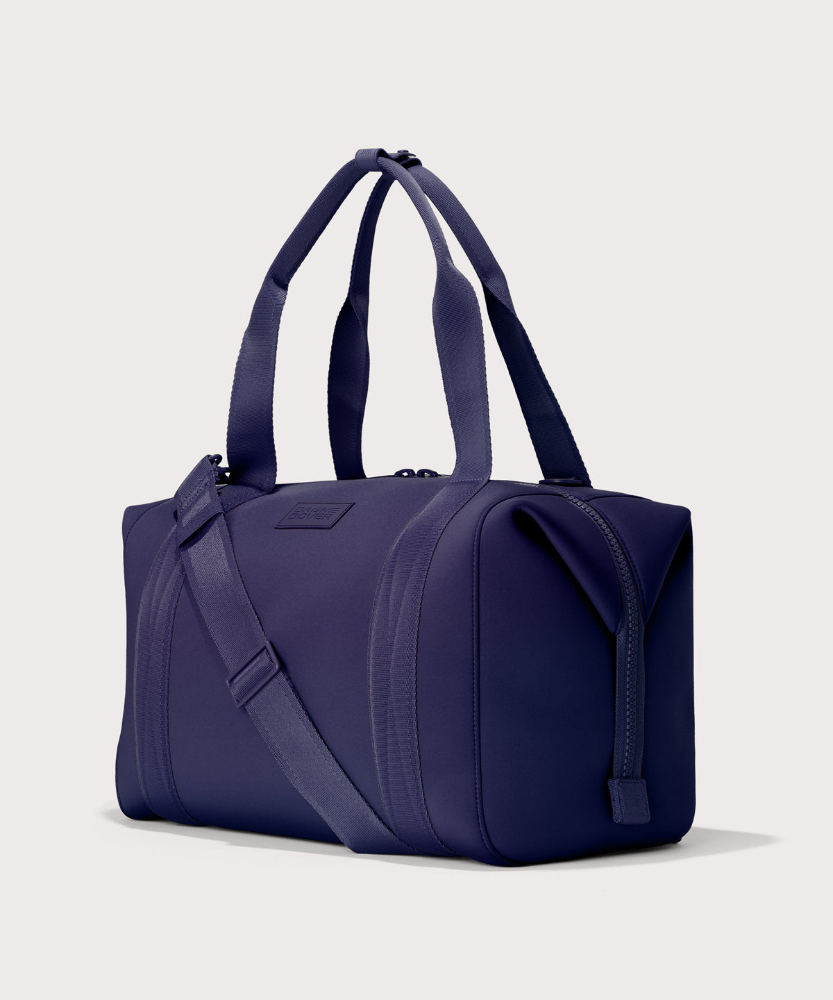 Large Landon Carryall in a jewel-toned, deep blue with strong purple undertones, side angle view
