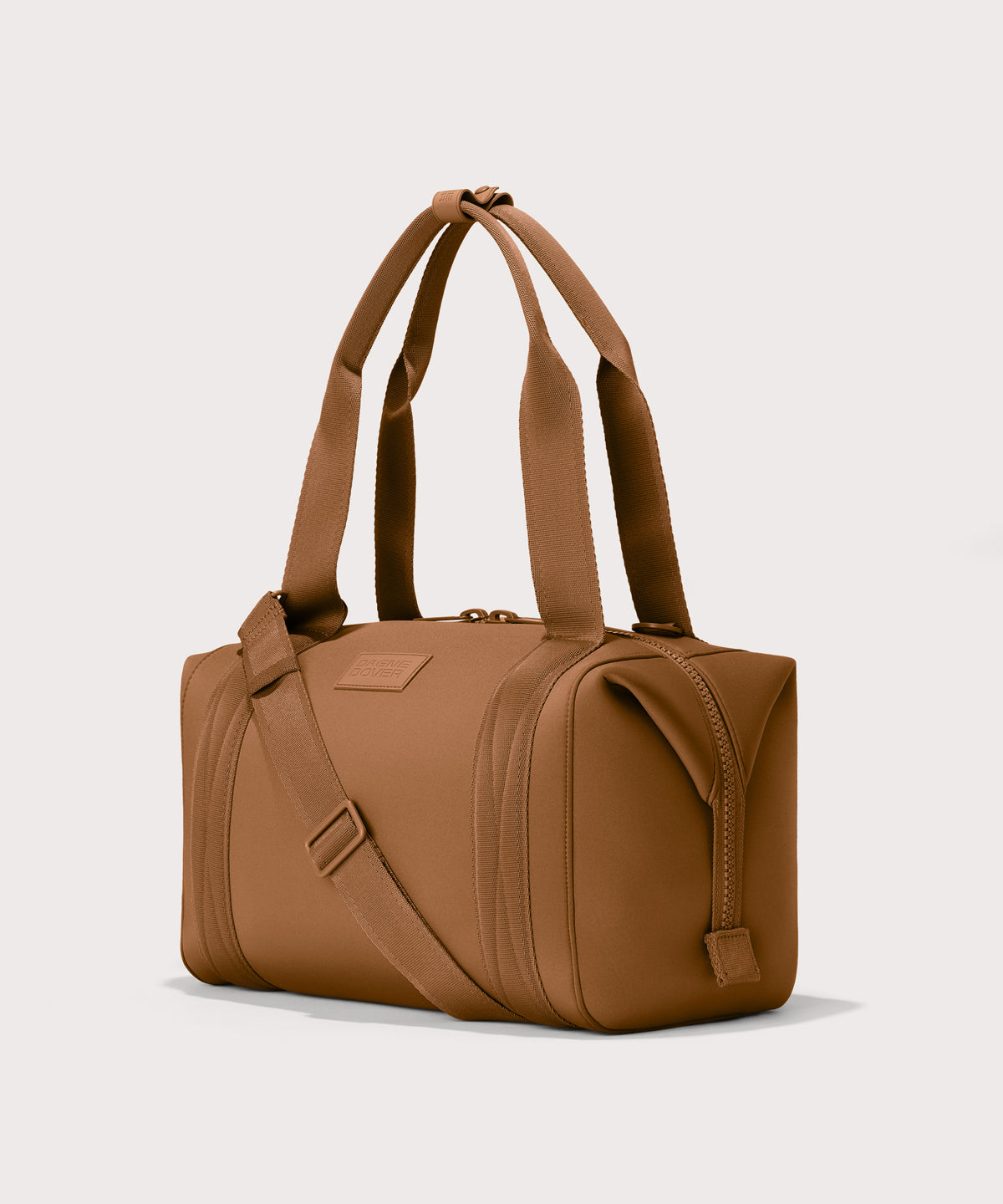 Medium Landon Carryall in a a saturated, warm medium-brown with burnt orange undertones, side angle view
