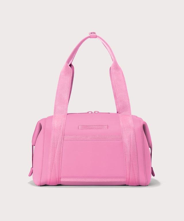 Dagne Dover Medium Landon Carryall in a true bubble gum pink seen from the back.