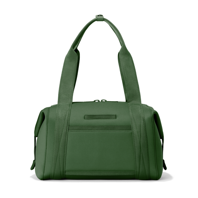 Dagne Dover medium Landon Carryall in a rich, classic forest green seen from the back displaying an exterior phone pocket.
