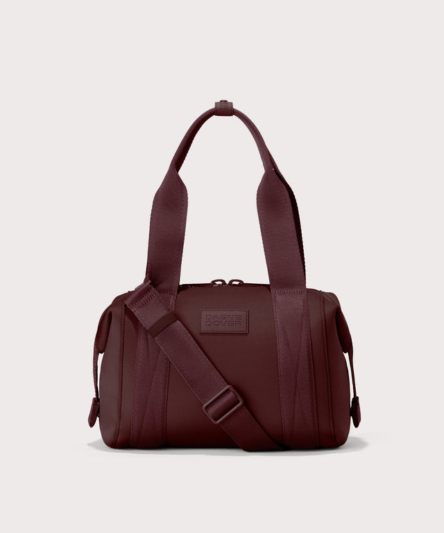 Dagne Dover Small Landon Carryall in a deep brown with purple undertones.