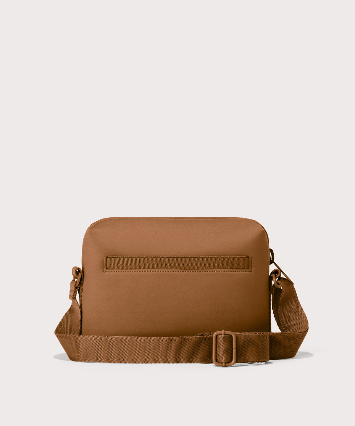 Micah crossbody bag in a saturated, warm medium-brown with burnt orange undertones Back view. 
