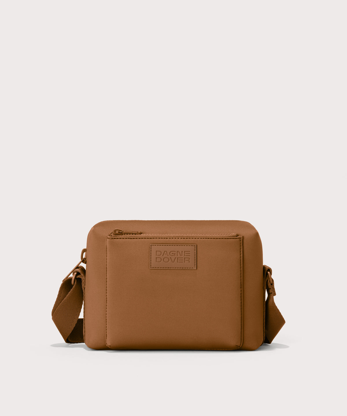 Micah crossbody bag in a saturated, warm medium-brown with burnt orange undertones