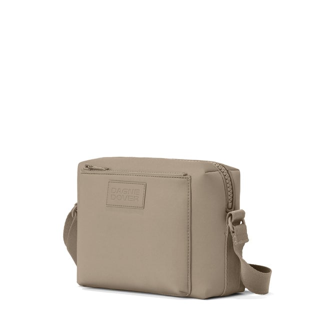 Dagne Dover Micah crossbody in khaki seen from an angle.