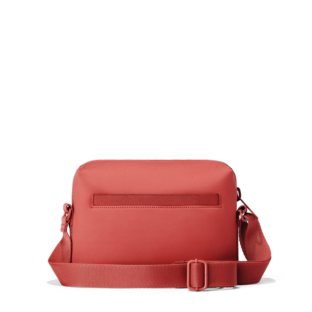 Dagne Dover Micah Crossbody in a poppy, vintage wash red seen from the back.