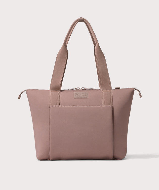 Tote  in a pink seen from the front view. 

