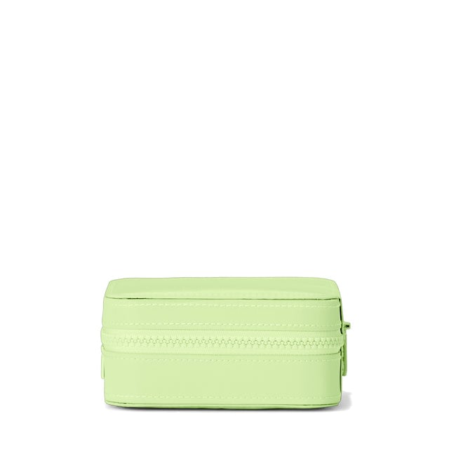 Dagne Dover Large Frankie Jewelry Case in a matcha green seen from a side.