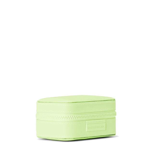 Dagne Dover Small Frankie Jewelry Case in a matcha green seen from an angle.