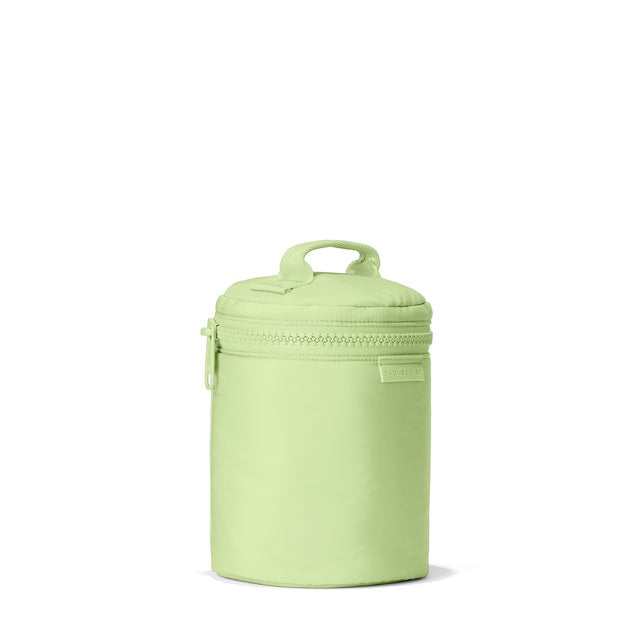 Dagne Dover large Mila Toiletry Pouch in matcha green seen from an angle.