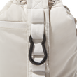 hover - Dagne Dover carabiner set in black clipped on to the back of the Nova Sling Bag in white.