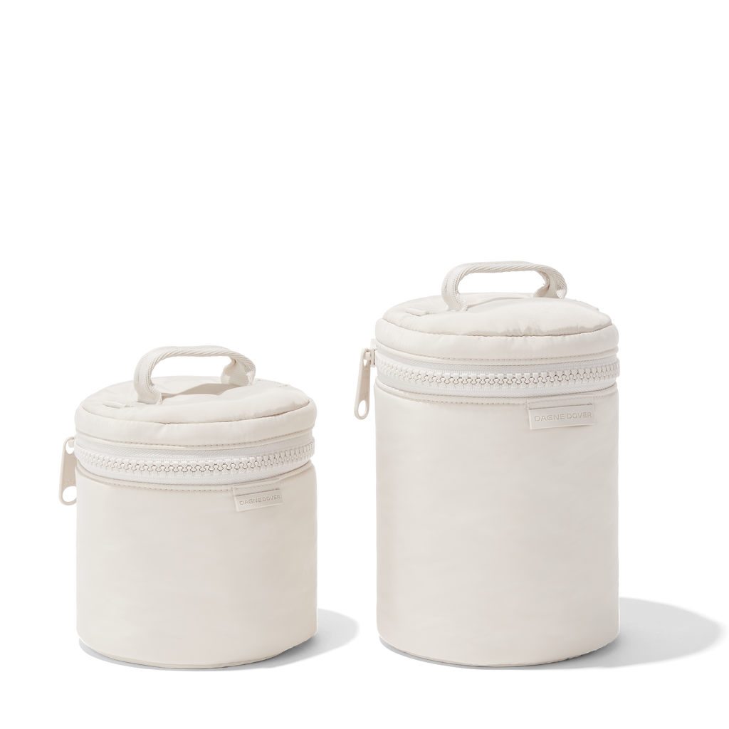 Dagne Dover small and large Mila Toiletry Pouches in white.