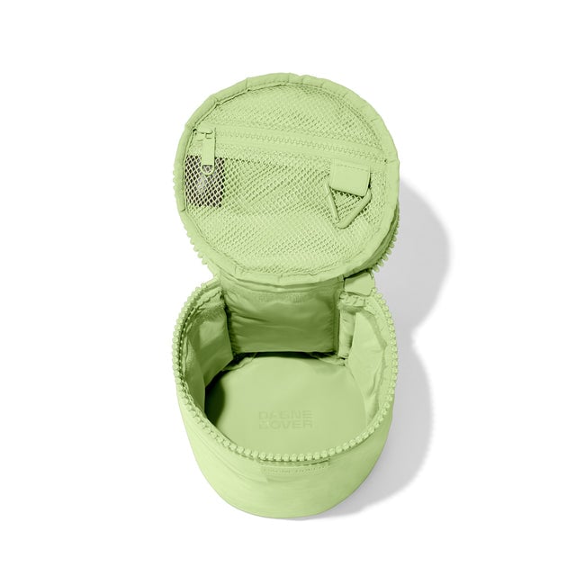 Dagne Dover large Mila Toiletry Pouch in matcha green unzipped.