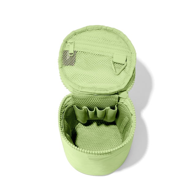 Dagne Dover large Mila Toiletry Pouch in matcha green unzipped with the removable airmesh insert.