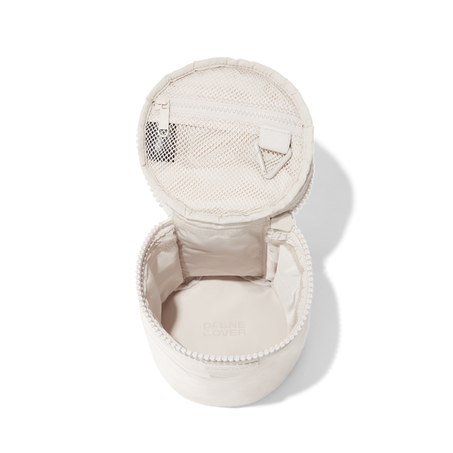 Dagne Dover large Mila Toiletry Pouch in white unzipped.