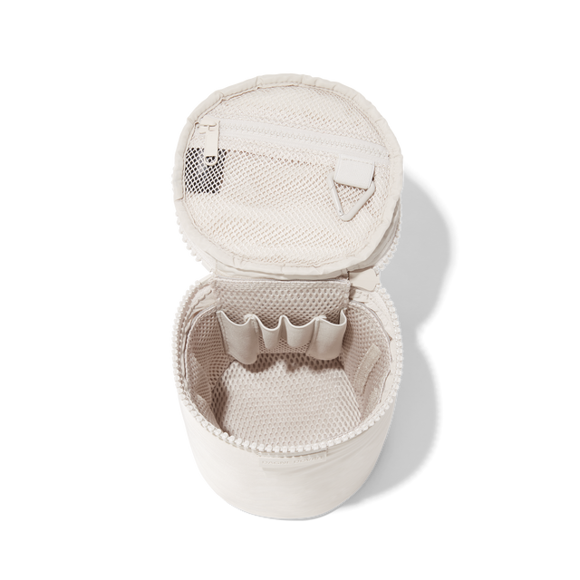 Dagne Dover large Mila Toiletry Pouch in white unzipped with the removable airmesh insert.