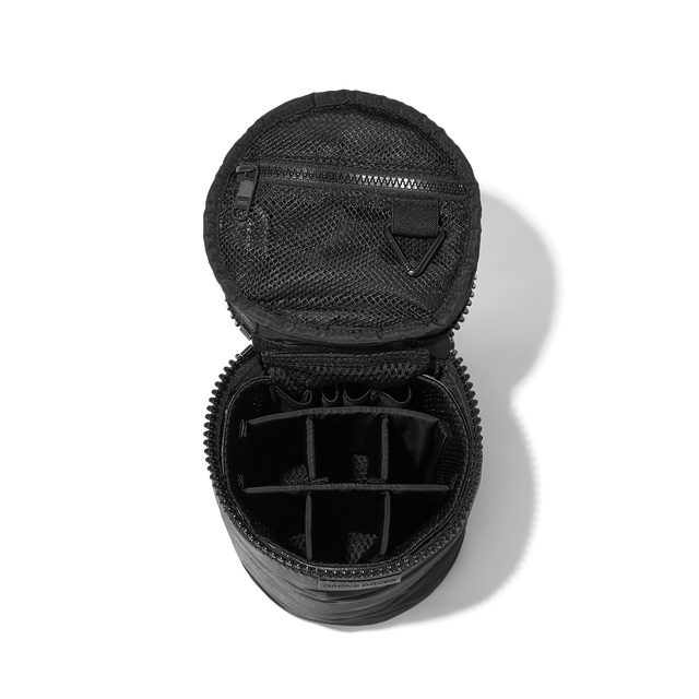 Dagne Dover large Mila Toiletry Pouch in black unzipped with the 6 adjustable compartments.