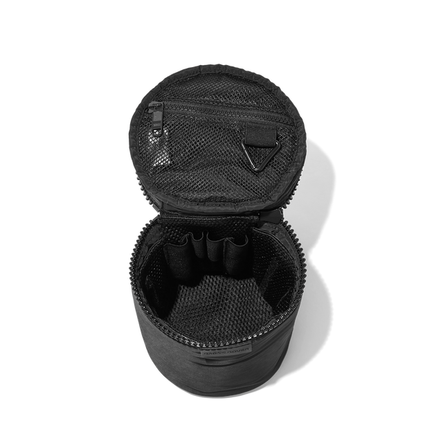 Dagne Dover large Mila Toiletry Pouch in black unzipped with the removable airmesh insert.