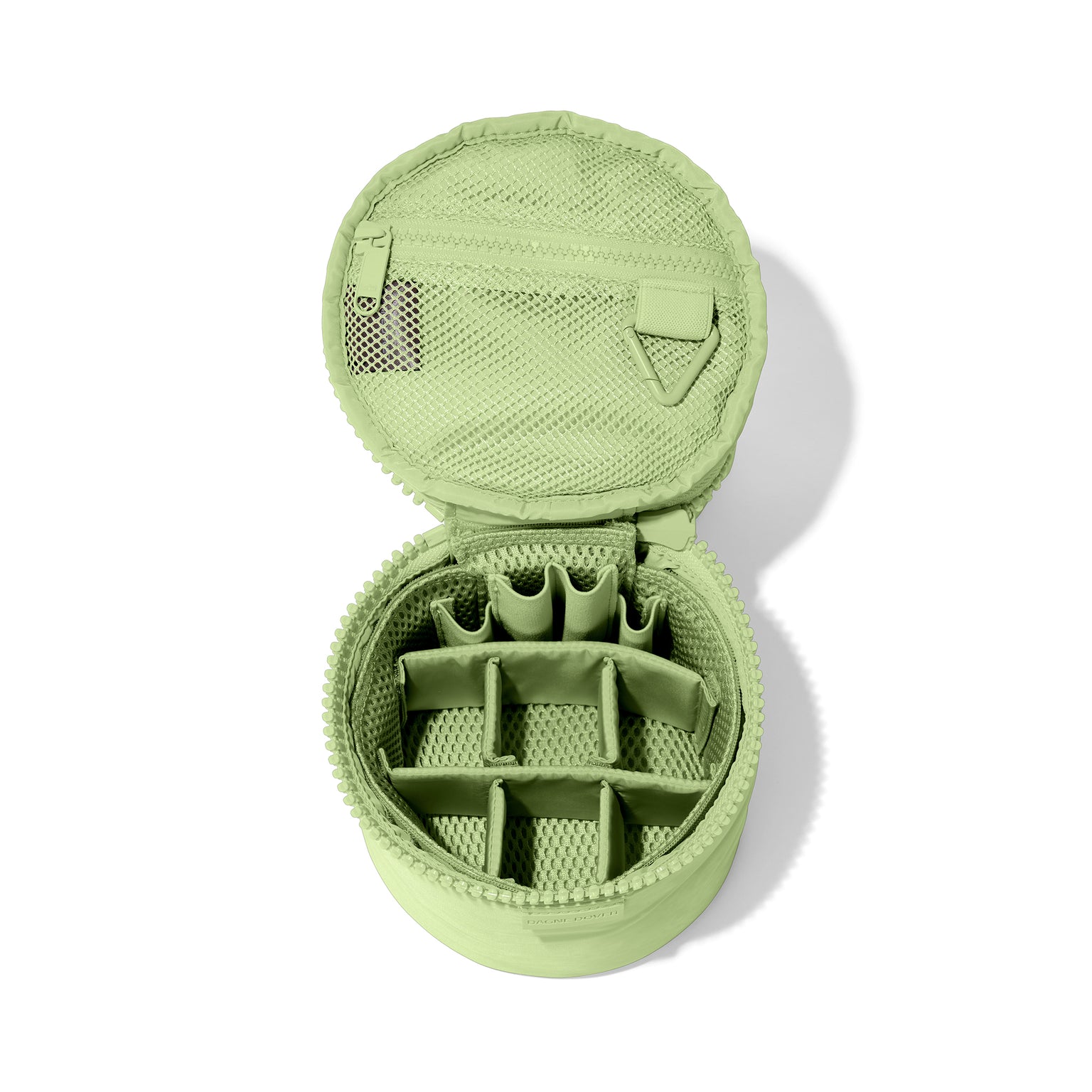 Dagne Dover small Mila Toiletry Pouch in matcha green unzipped with the 6 adjustable compartments.