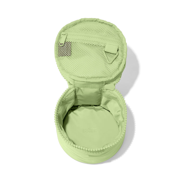 Dagne Dover small Mila Toiletry Pouch in matcha green unzipped.