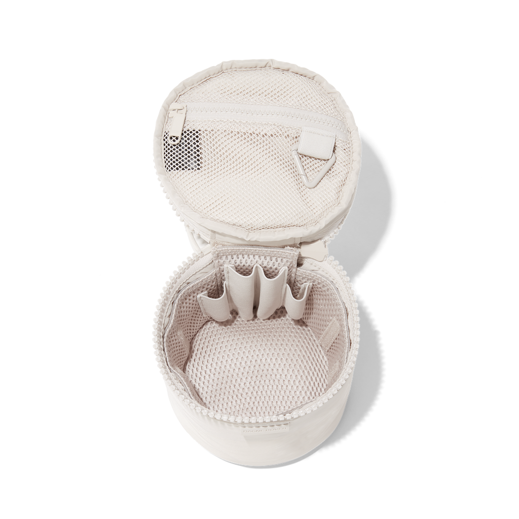 Dagne Dover small Mila Toiletry Pouch in white unzipped with the removable airmesh insert.