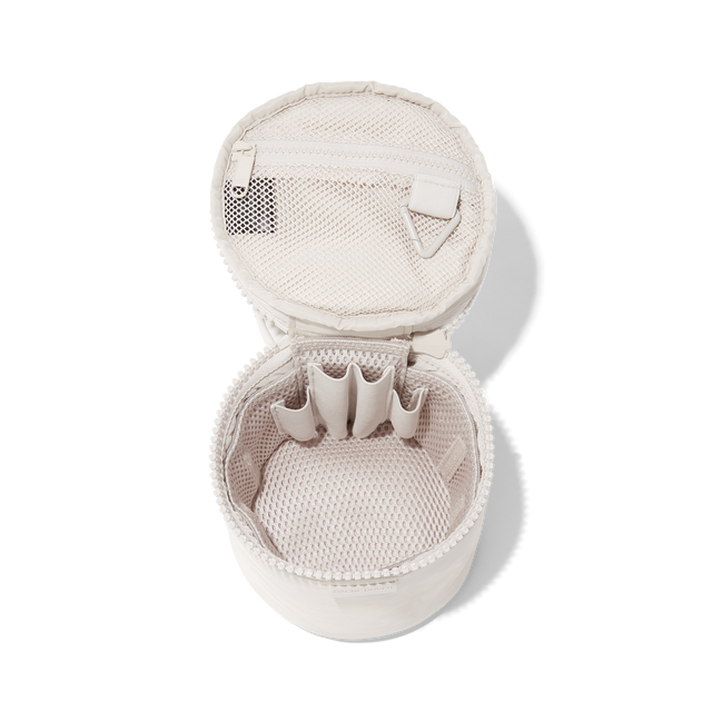 Dagne Dover small Mila Toiletry Pouch in white unzipped with the removable airmesh insert.