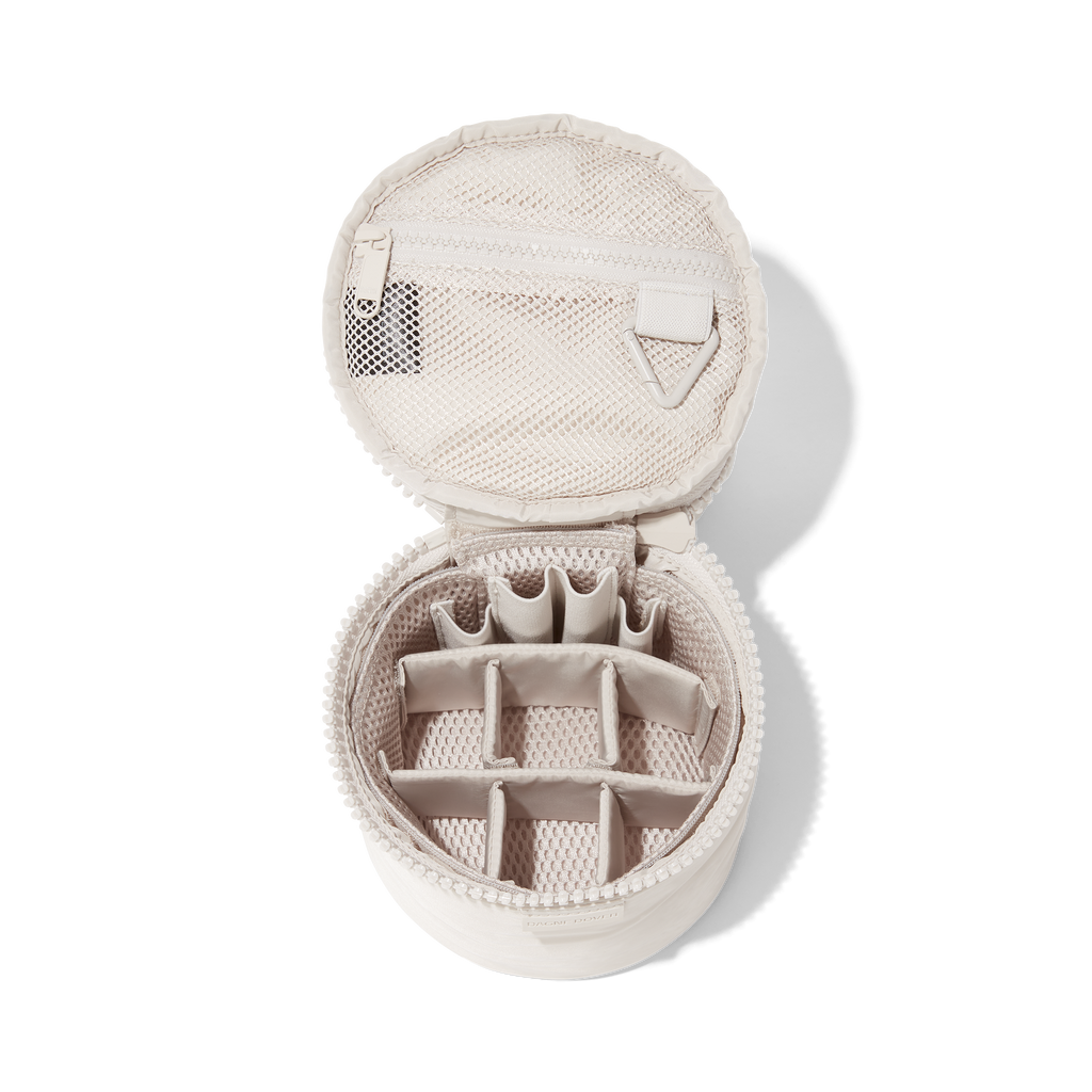 Dagne Dover small Mila Toiletry Pouch in white unzipped with the 6 adjustable compartments.