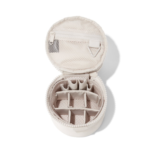 Dagne Dover small Mila Toiletry Pouch in white unzipped with the 6 adjustable compartments.