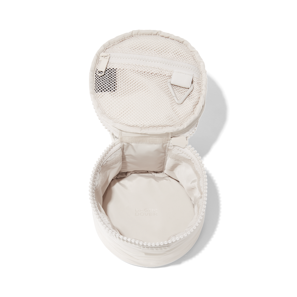 Dagne Dover small Mila Toiletry Pouch in white unzipped.