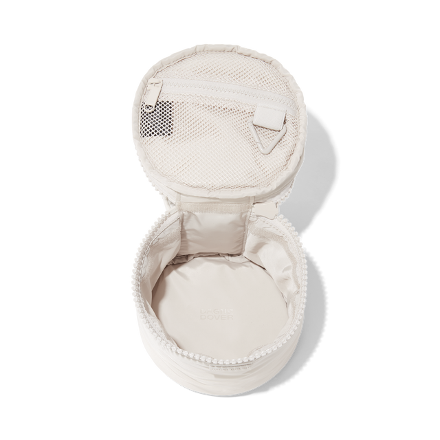 Dagne Dover small Mila Toiletry Pouch in white unzipped.