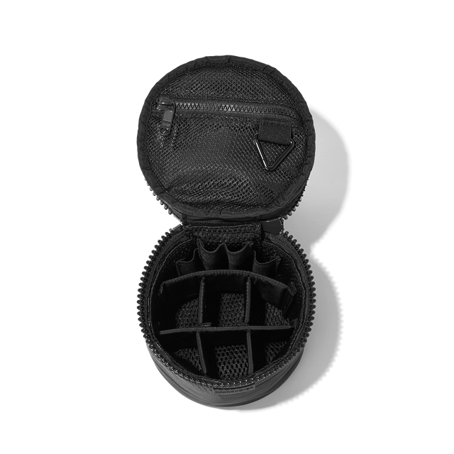 Dagne Dover small Mila Toiletry Pouch in black unzipped with the 6 adjustable compartments.
