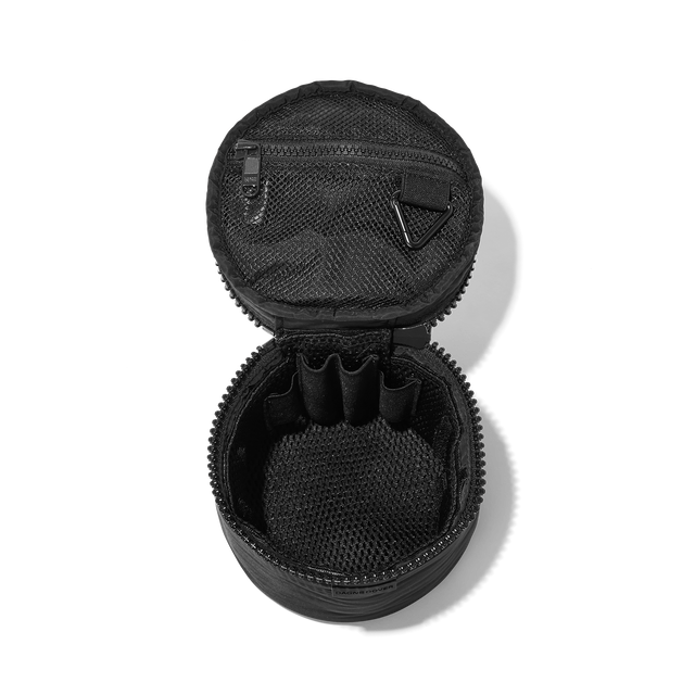 Dagne Dover small Mila Toiletry Pouch in black unzipped with the removable airmesh insert.