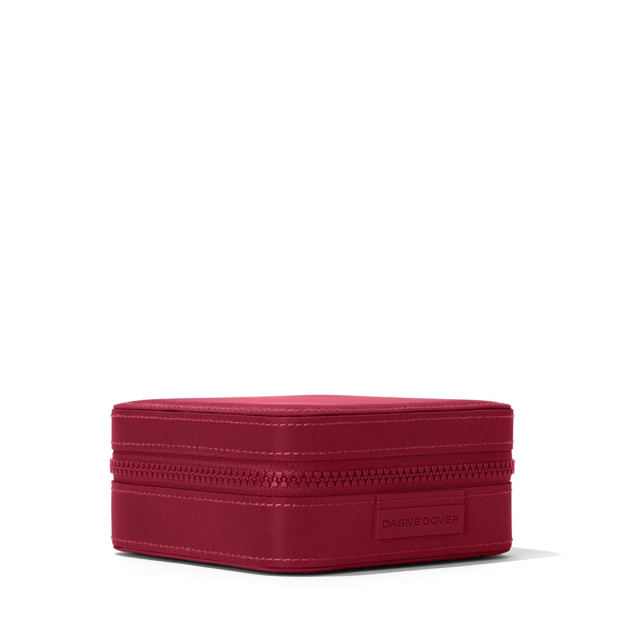 Dagne Dover Large Frankie Jewelry Case in a spice red seen from an angle.