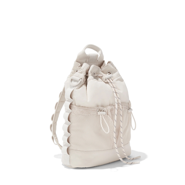 Dagne Dover Nova Sling Bag in white seen from an angle.