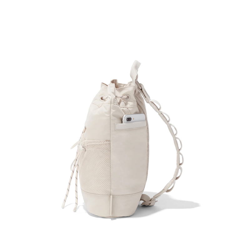 Dagne Dover Nova Sling Bag in white seen from the side.