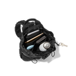 hover - Dagne Dover Nova Sling Bag in black opened, revealing the interior phone pocket and interior airmesh pockets.