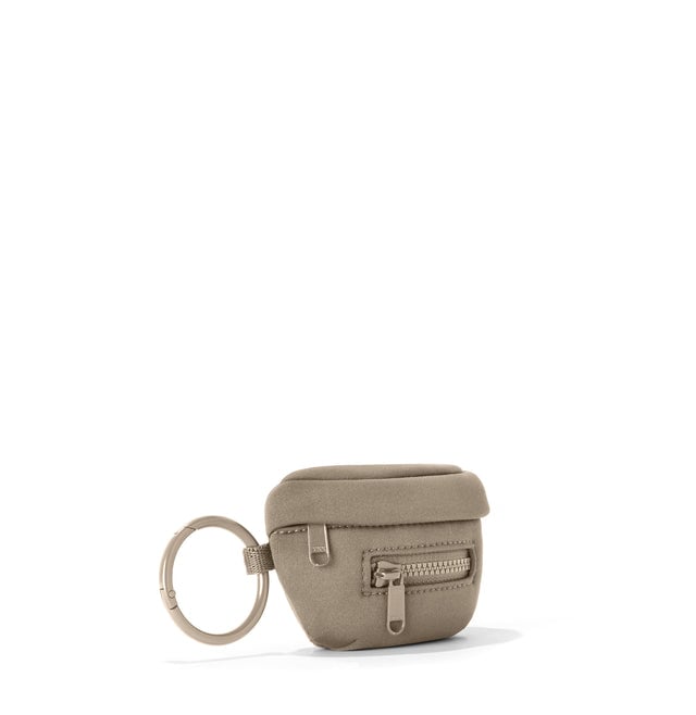 Dagne Dover Ace Keychain in a medium-dark, creamy tan seen from an angle.