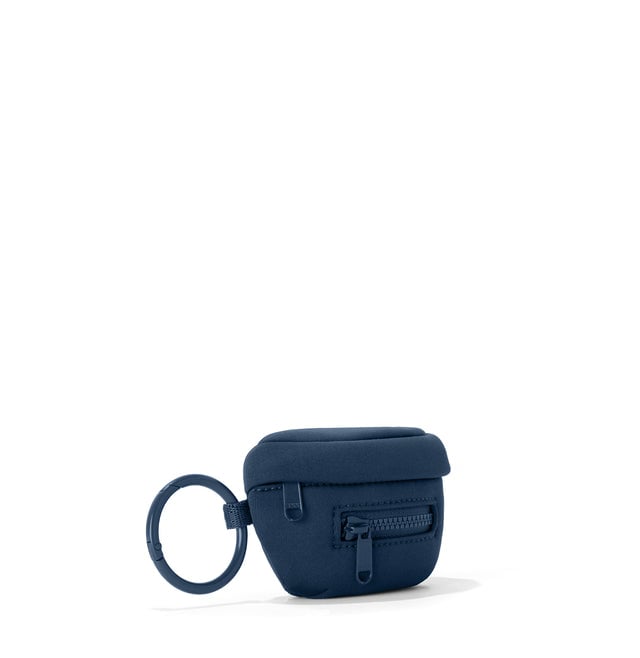 Dagne Dover Ace Keychain in a medium grey-blue with a touch of turquoise seen from an angle.