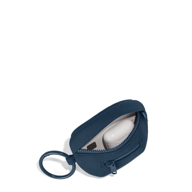 Dagne Dover Ace Keychain in a medium grey-blue with a touch of turquoise unzipped, showing interior.