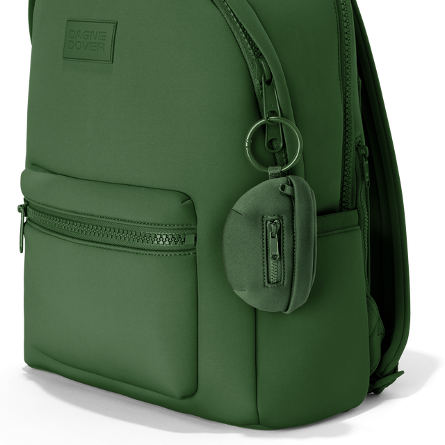 Dagne Dover Ace Keychain in a rich, classic forest green clipped onto a backpack. hover

