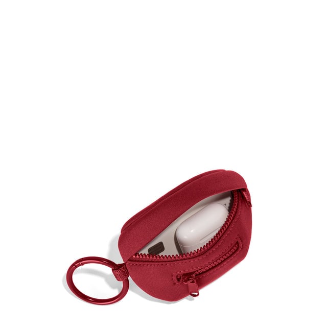 Dagne Dover Ace Keychain in a punchy, saturated deep red unzipped, showing interior.