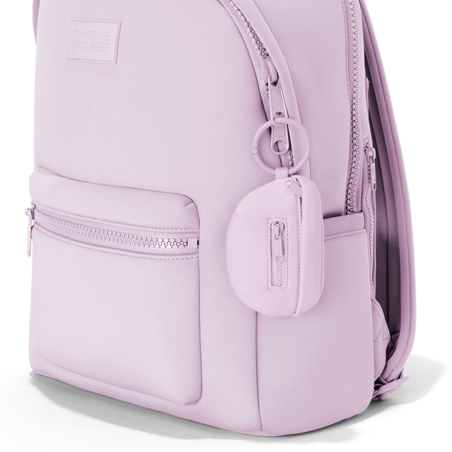 Dagne Dover Ace Keychain in a soft purple with grey undertones clipped onto a backpack. hover
