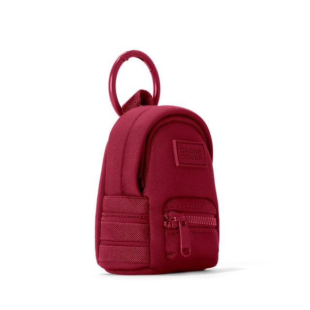 Dagne Dover Dakota Keychain in a punchy, saturated deep red seen from an angle.
