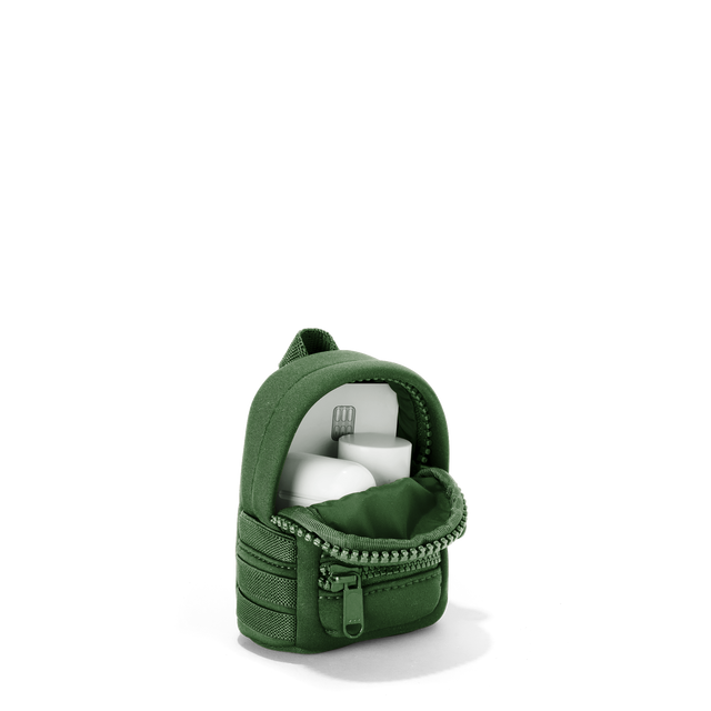 Dagne Dover Dakota Keychain in a rich, classic forest green unzipped, showing interior.
