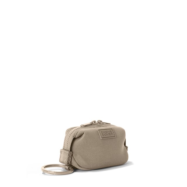 Dagne Dover Hunter Keychain in a medium-dark, creamy tan seen from an angle.