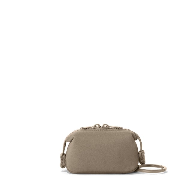 Dagne Dover Hunter Keychain in a medium-dark, creamy tan seen from the back.