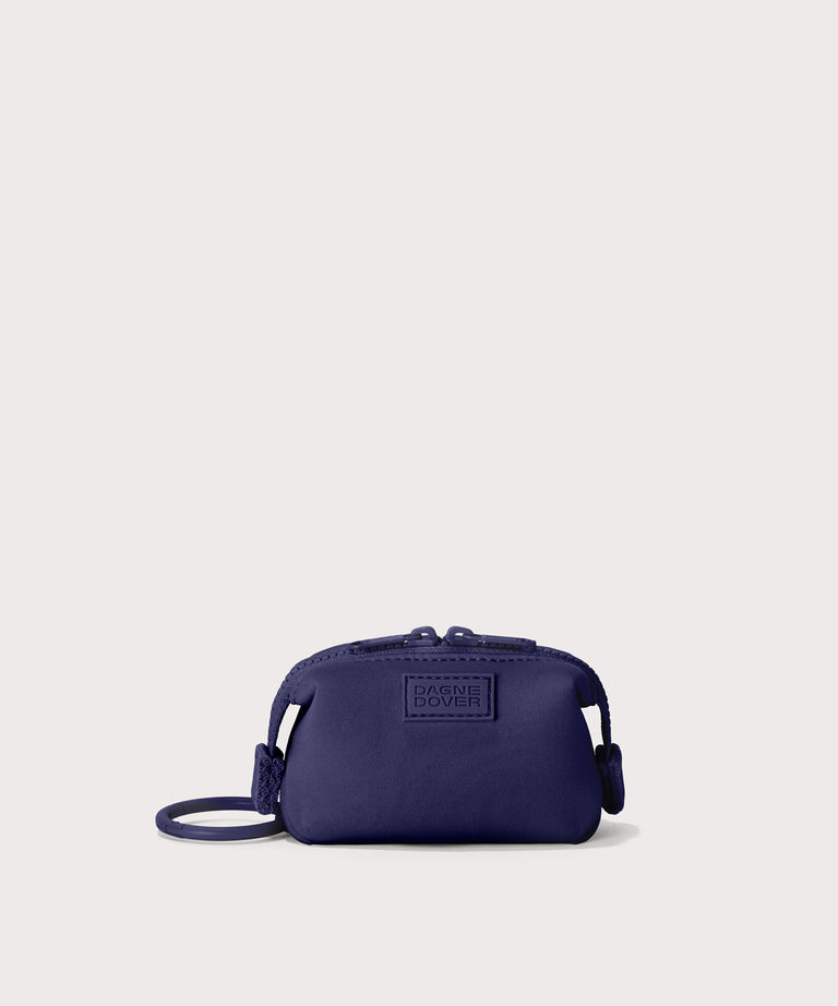 Hunter keychain in a jewel-toned, deep blue with strong purple undertones. 
