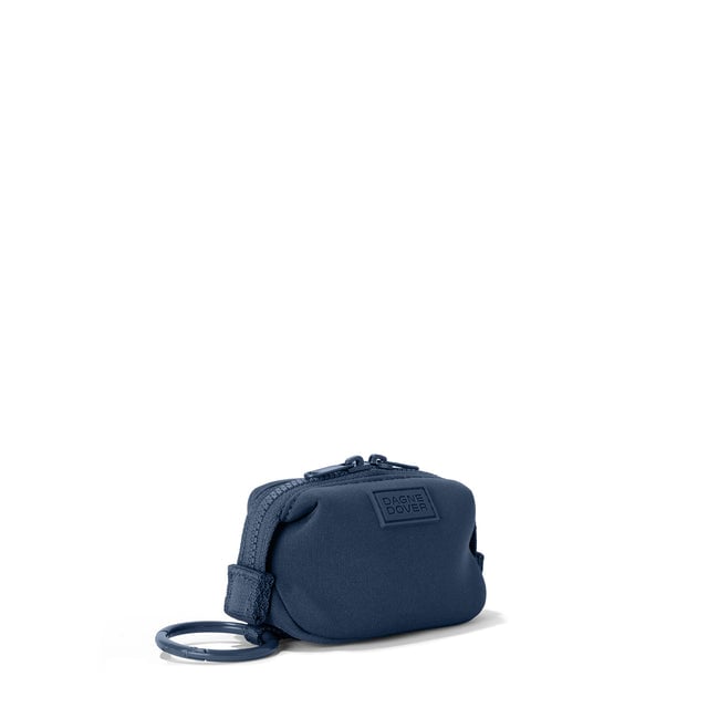 Dagne Dover Hunter Keychain in a medium grey-blue with a touch of turquoise seen from an angle.