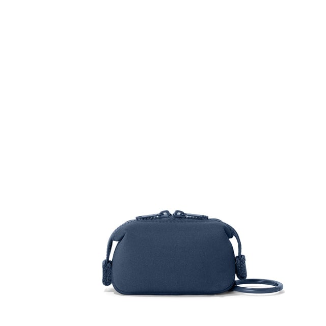 Dagne Dover Hunter Keychain in a medium grey-blue with a touch of turquoise seen from the back.